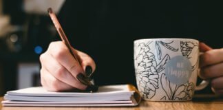 How to kick start your career as a writer Person Holding White Ceramci Be Happy Painted Mug